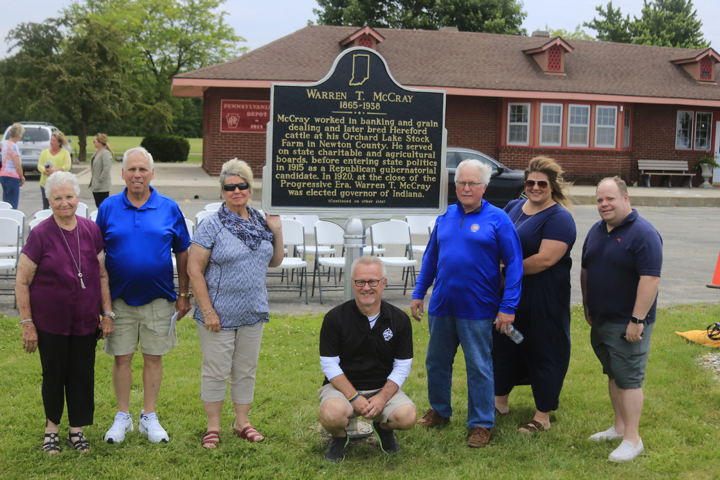 County officials with state marker